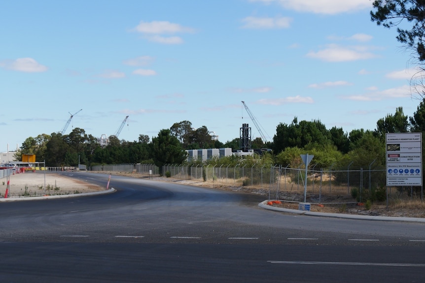 A wide shot of the road entrance to Albemarle's Kemerton lithium hydroxide plant near Bunbury