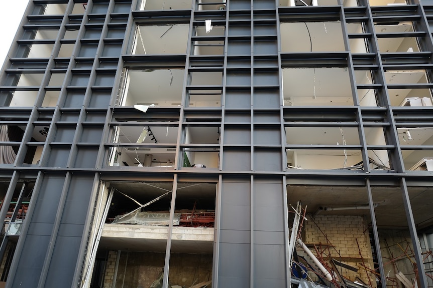 The smashed facade of a Beirut building