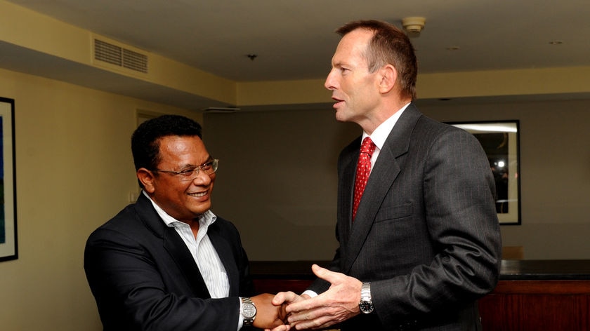 'Not a negotiation': Tony Abbott shakes hands with Nauru's president Marcus Stephen