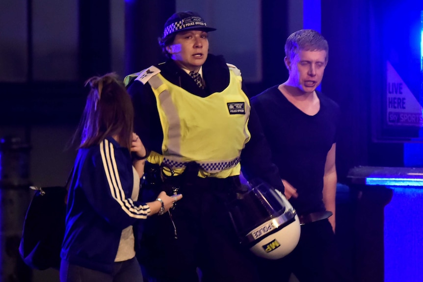 Police attend to an incident on London Bridge.