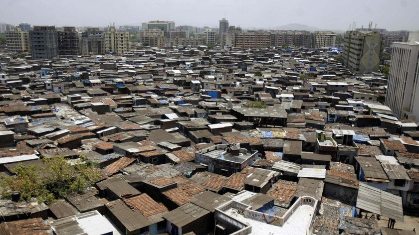 Vision of the future: High-rise buildings stand next to Dharavi in Mumbai, the largest slum area in Asia