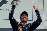 Red Bull Formula One driver Mark Webber celebrates after winning the British F1 Grand Prix at Silverstone.