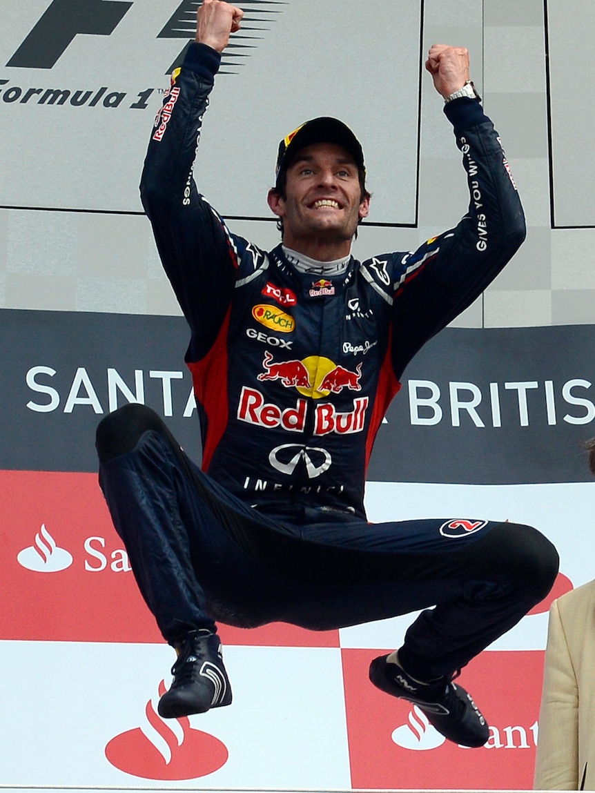 Red Bull Formula One driver Mark Webber celebrates after winning the British F1 Grand Prix at Silverstone.