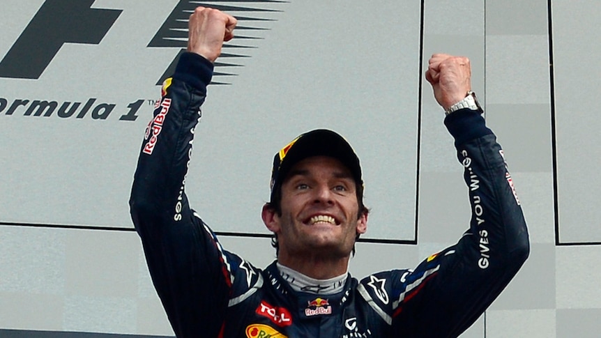 Silverstone joy ... Mark Webber celebrates his win in England.