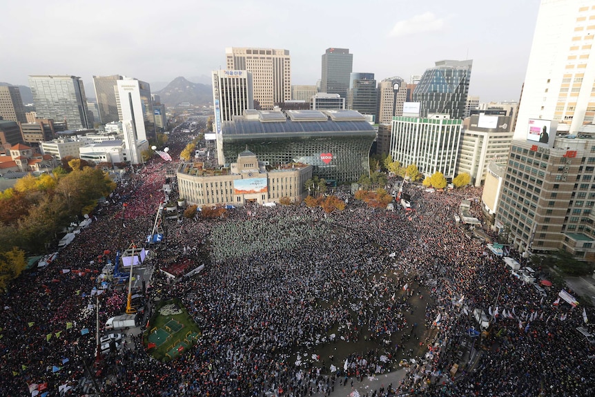 Aerial view shows thousands of people gathered at a rally in Seoul.
