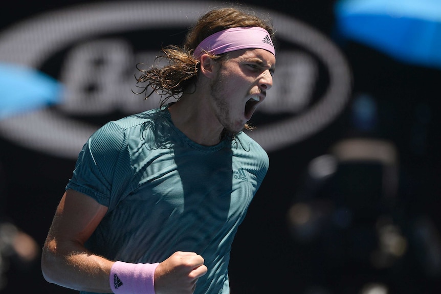 Stefanos Tsitsipas scream out after winning a point against Bautista Agut.