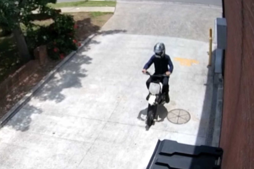 A man in a motorcycle helmet