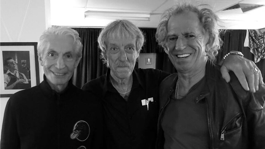 Sam Cutler with Charlie Watts (left) and Keith Richards (right)