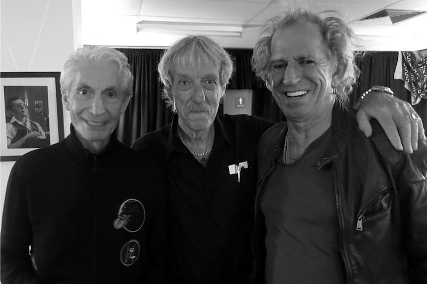 Sam Cutler with Charlie Watts (left) and Keith Richards (right)