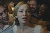 Close-up still image from 2017 film Mother! of Jennifer Lawrence, her facial expression is one of upset.