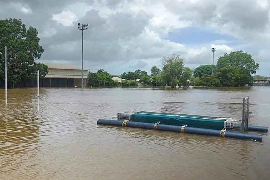 A crocodile trap tied to football goalposts in flooded Daly River.