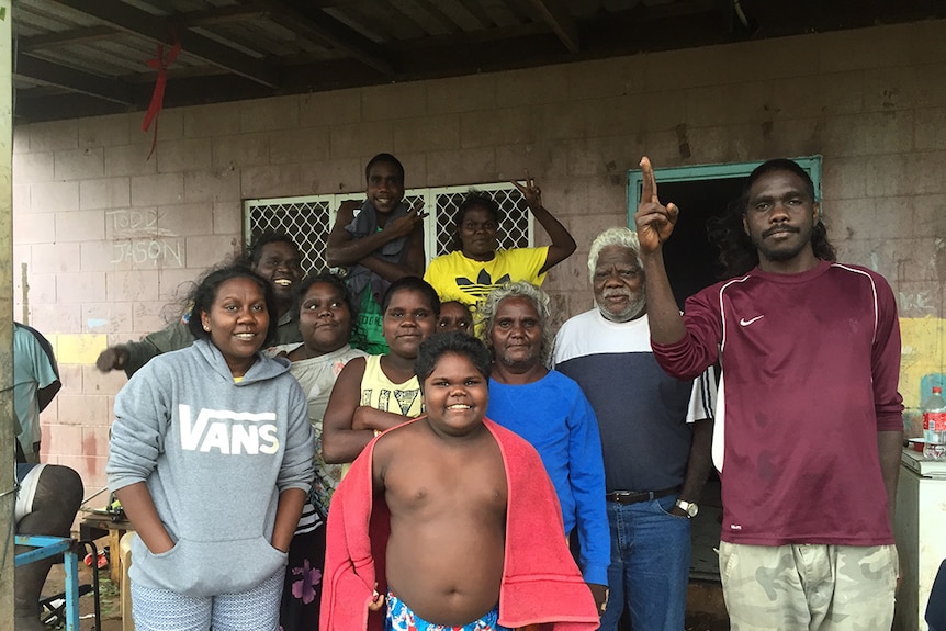The day after Cyclone Lam hit Milingimbi some of the locals were happy to have survived unscathed