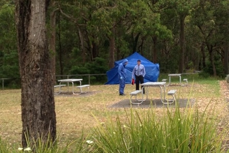 Forensic officers and homicide detectives are at Bangalay Reserve at Windale, combing the area for clues.