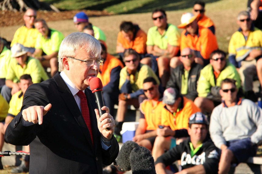 Kevin Rudd speaks to construction workers in Musgrave Park, South Brisbane.