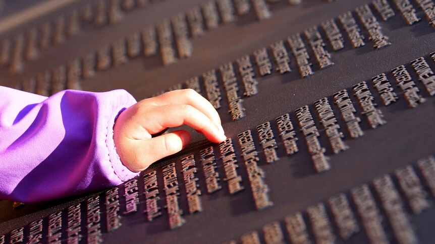 A child remembers great, great, great grandfather at the Titanic memorial in Belfast.