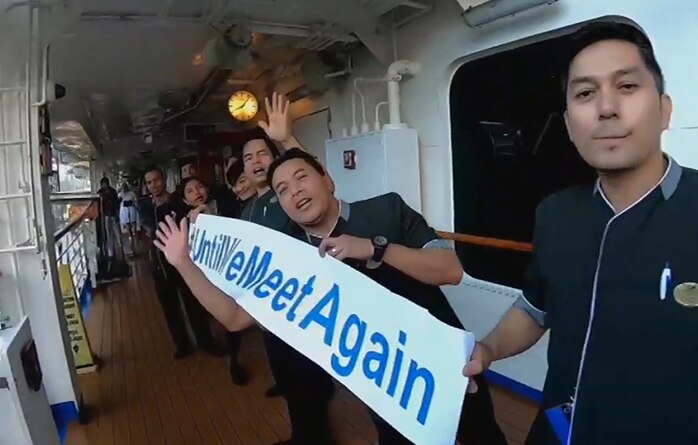 Crew from the Ruby Princess lined the decks to farewell passengers as they disembarked at Sydney Harbour.