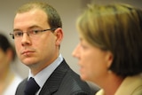 The Opposition has accused Premier Anna Bligh and Treasurer Andrew Fraser of muck-raking in relation to pecuniary interest claims.