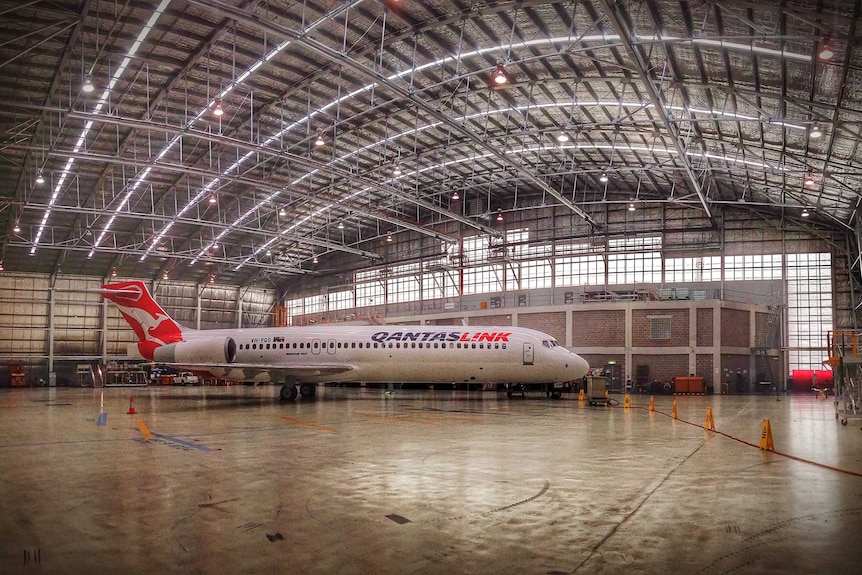 Qantas Link Boeing 717 inside the maintenance hangar at Canberra Airport