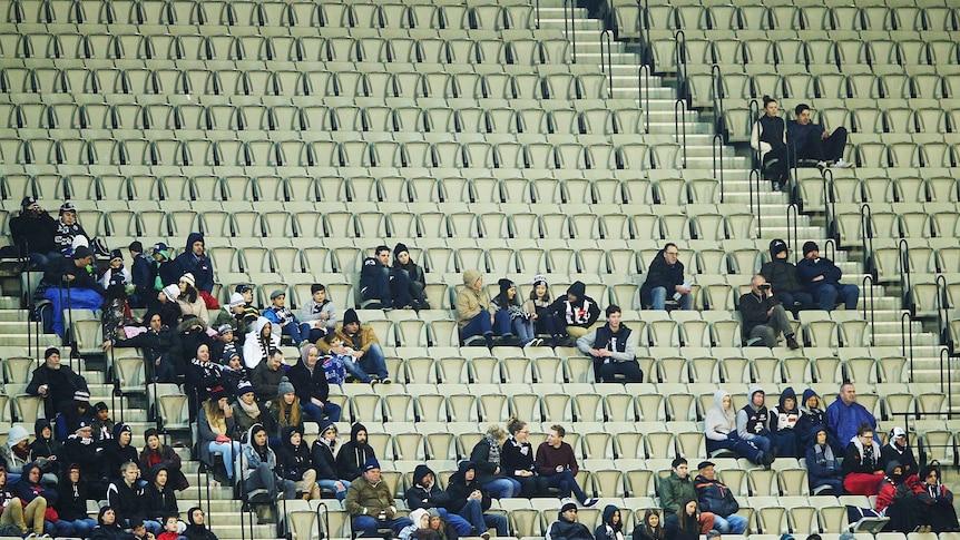 Empty seats at AFL clash between Collingwood and Carlton
