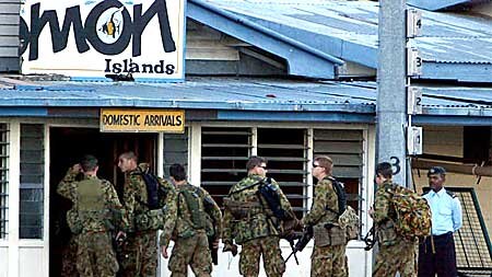 Proud: Troops say the mission has improved the lives of islanders.
