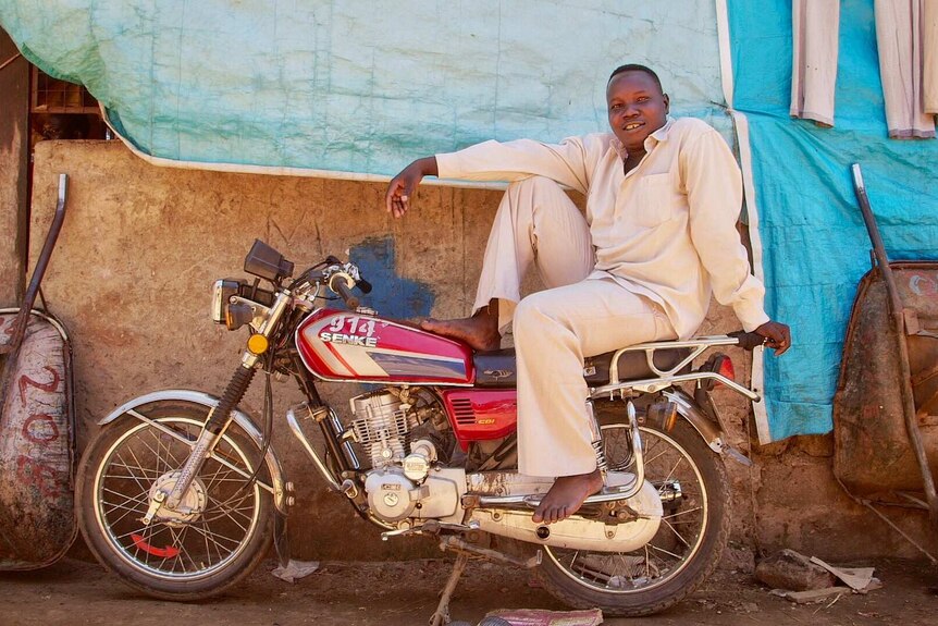 Easy rider at the market in Torit.