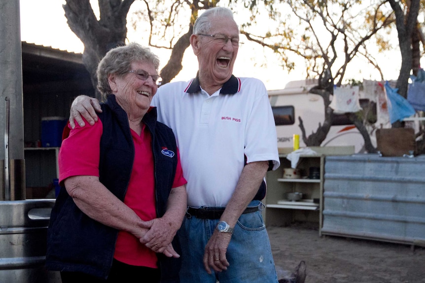Marg and Neville Peoples at the Peoples' family campsite for the Birdsville Races