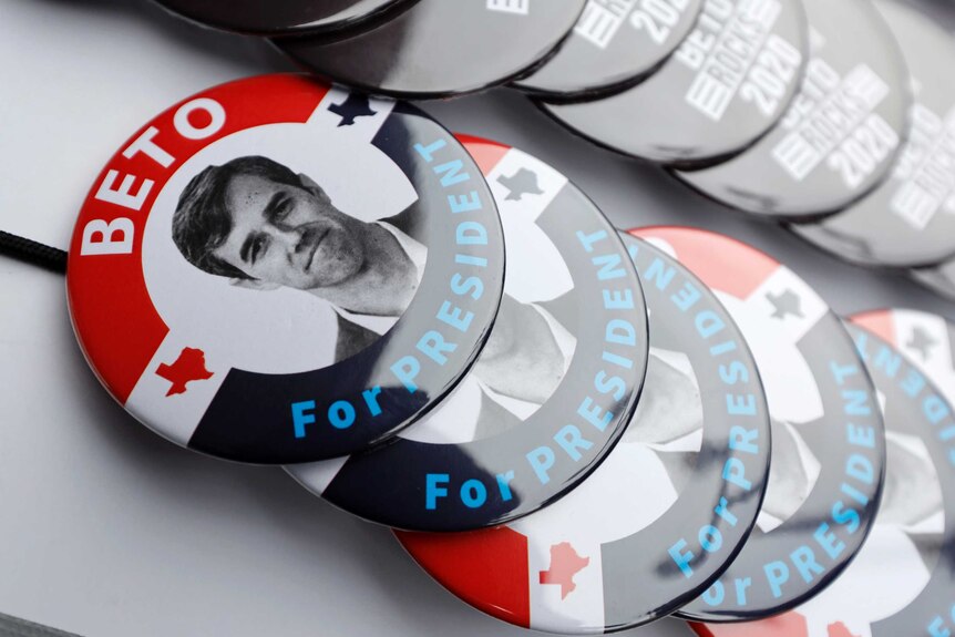 A collection of badges with Beto's face in black and white and the words 'Beto for president'.