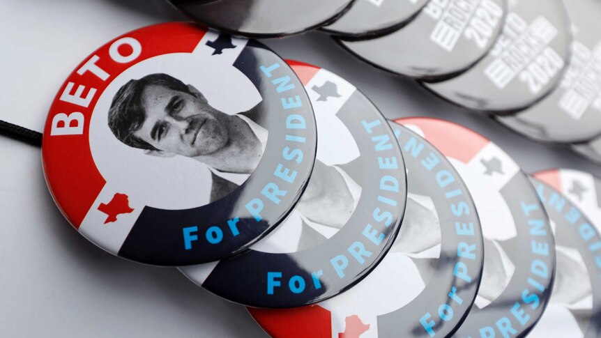 A collection of badges with Beto's face in black and white and the words 'Beto for president'.