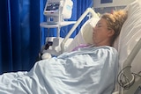 Stacey Mason recovers in hospital after her kidney transplant.