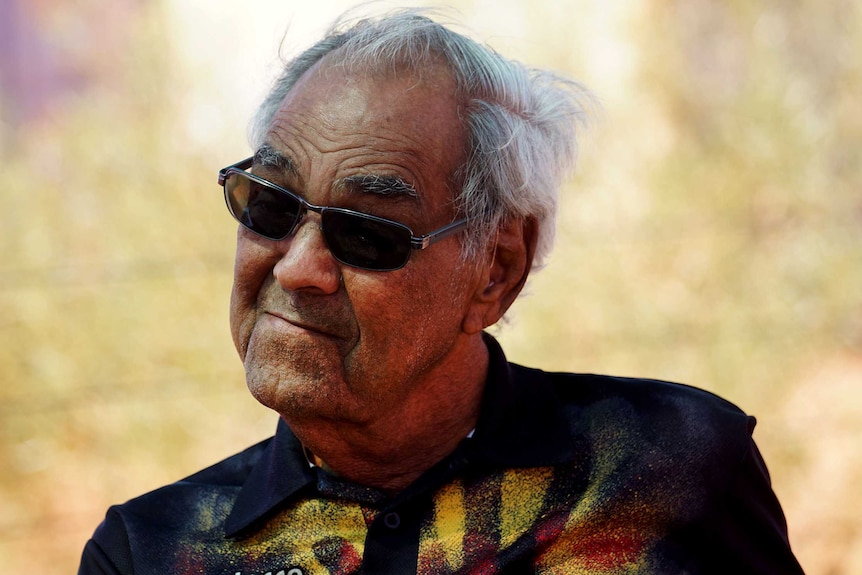 Ngarluma elder David Walker wearing sunglasses and a black t-shirt.