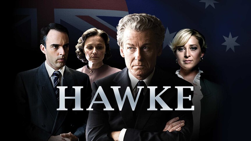 Actor as Bob Hawke, amongst other Australian political figures against an Australian flag obscured in the dark