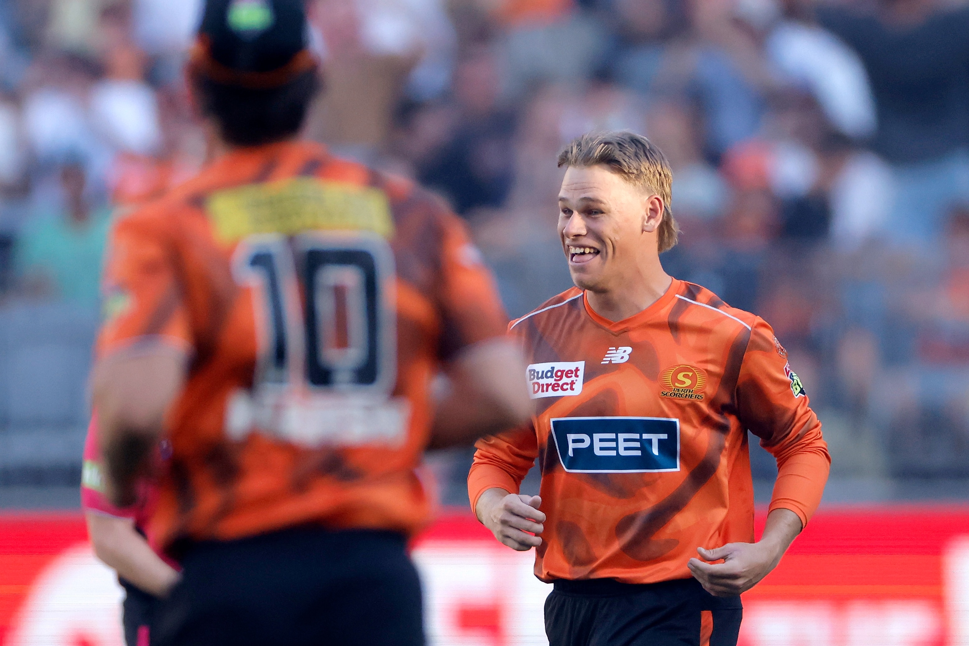 Cooper Connolly sonríe después de tomar un portillo