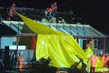 Emergency workers pull tarp on house with no roof at Pratten, near Warwick