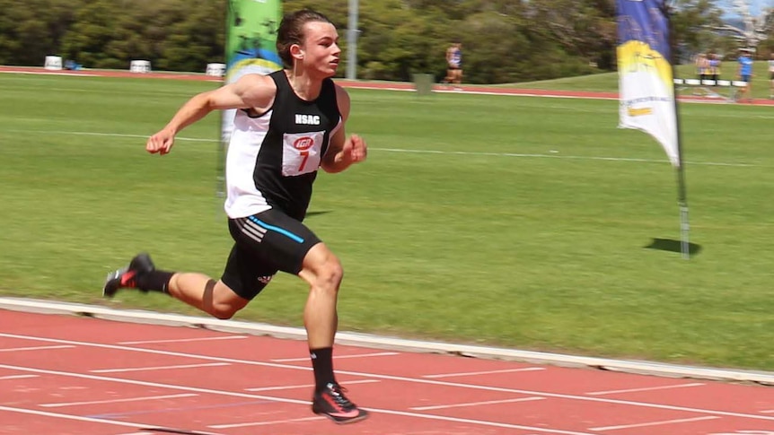 Young Tasmanian athlete Jack Hale approaches the finish line during an event in Hobart.