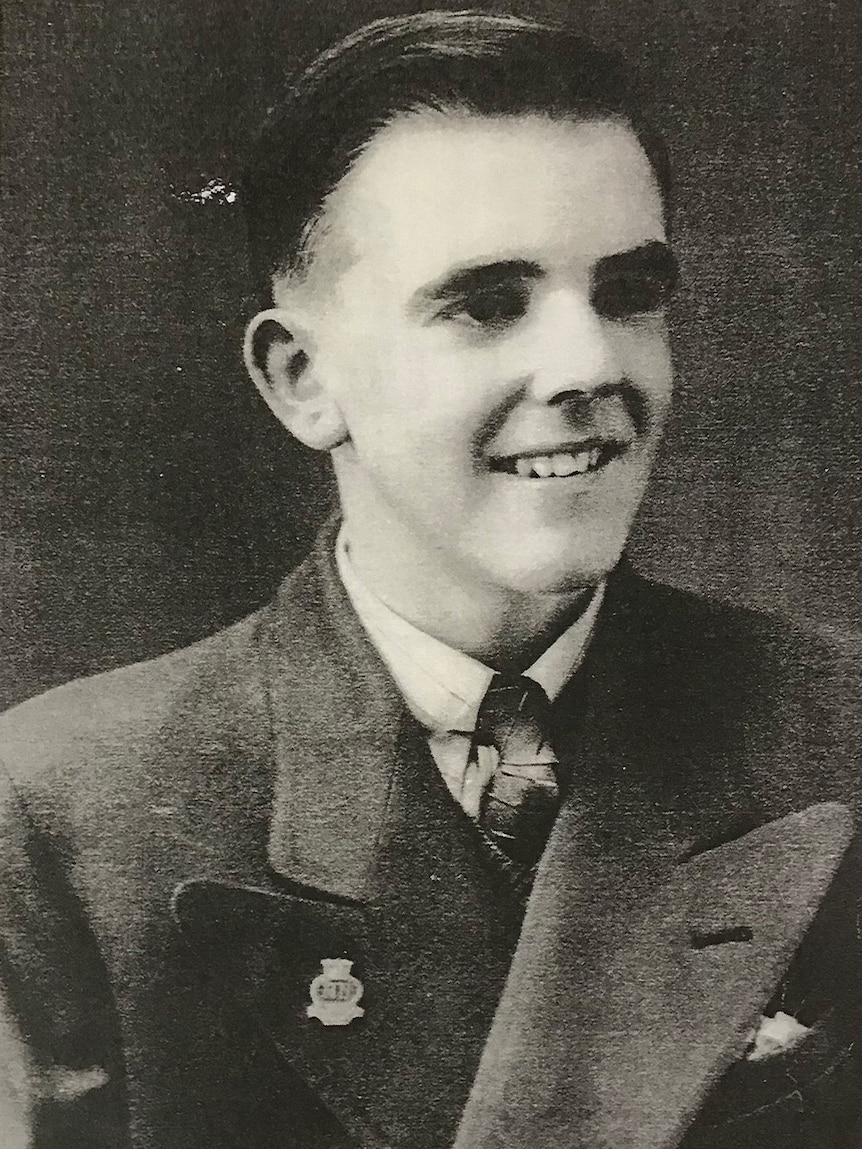 A young man in 1940s suit