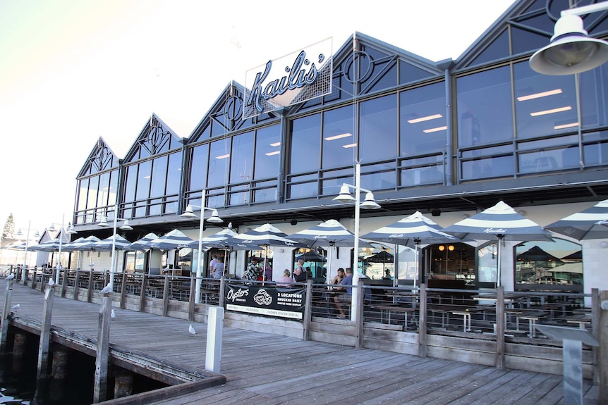 A wide shot of Kailis' Fishmarket Cafe in Fremantle during the daytime.