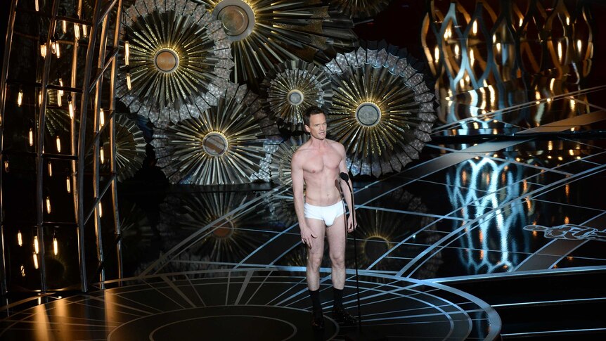 Neil Patrick Harris presents on screen at the 87th Oscars