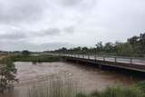 The normally dry Tennant Creek has been in flood after heavy rain