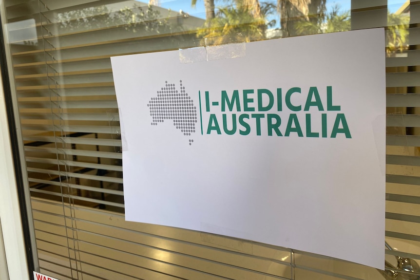 A photo of a sign printed on paper in a window, saying I-Medical Australia.