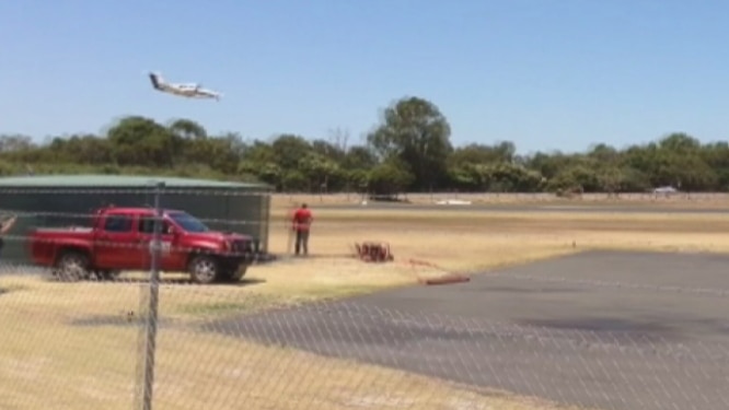 The light plane, which had landing gear problems, comes into land at Bunbury