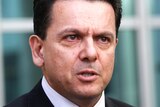 Independent Senator for South Australia Nick Xenophon speaks during a doorstop media conference at Parliament House