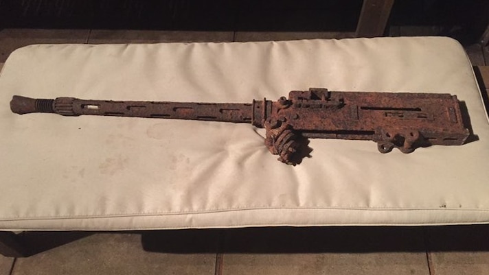 A rusted WWII machine gun.