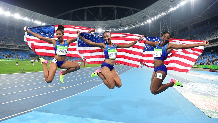USA's Kristi Castlin, Brianna Rollins and Nia Ali celebrate hurdles medals