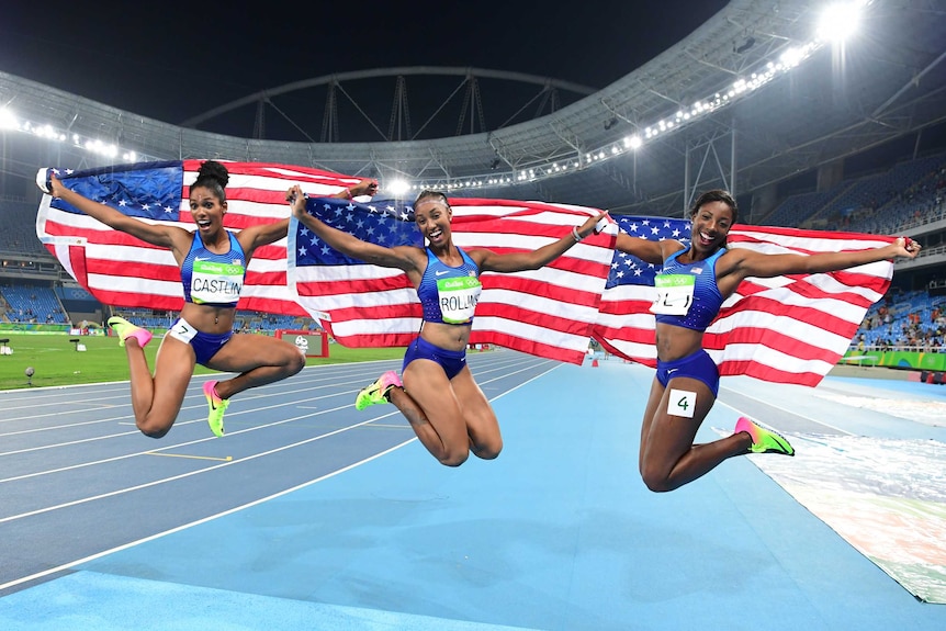 USA's Kristi Castlin, Brianna Rollins and Nia Ali celebrate hurdles medals