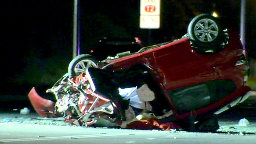 Wreck of one of the two cars involved in a triple fatal crash.