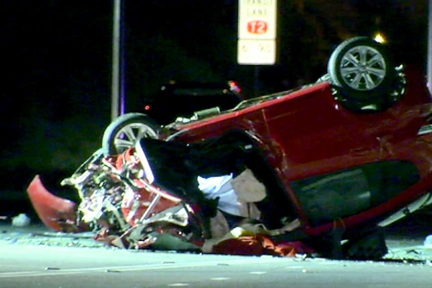 Wreck of one of the two cars involved in a triple fatal crash.