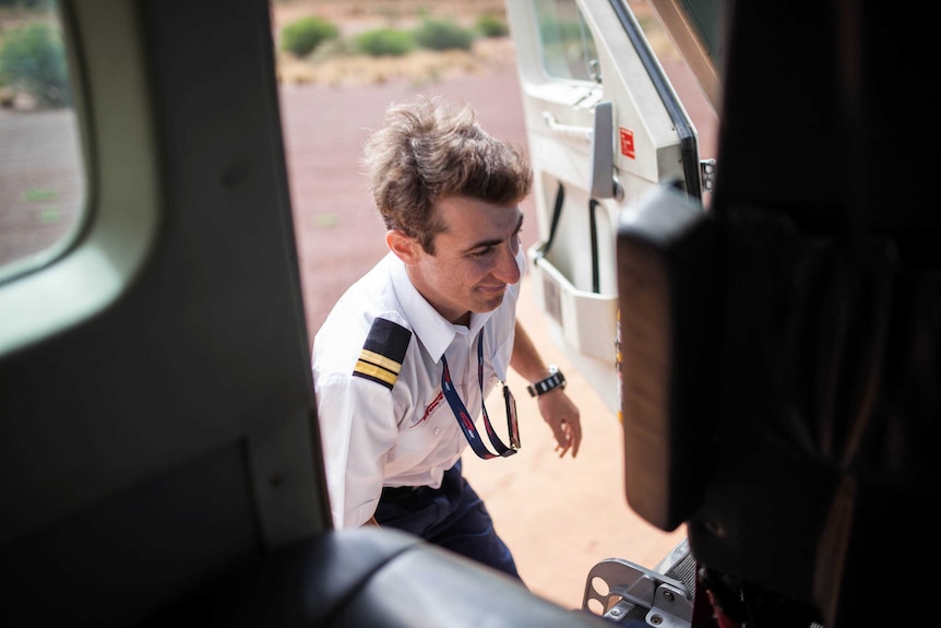 Pilot Harvey Salameh enters the cockpit of a remote charter flight in WA.