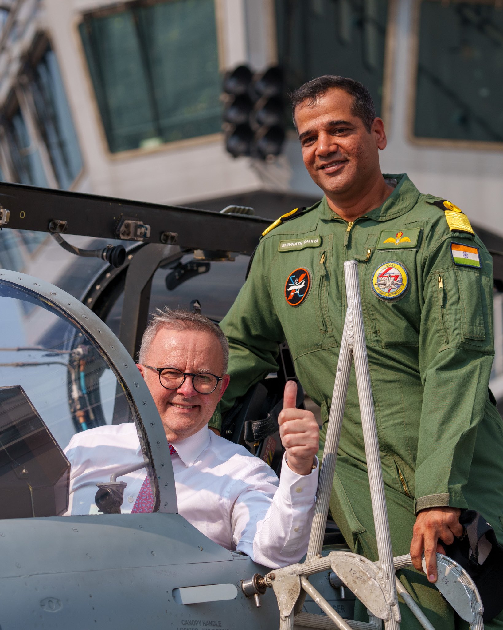 Anthony Albanese gives the thumbs up from the cockpit of a fighter jet