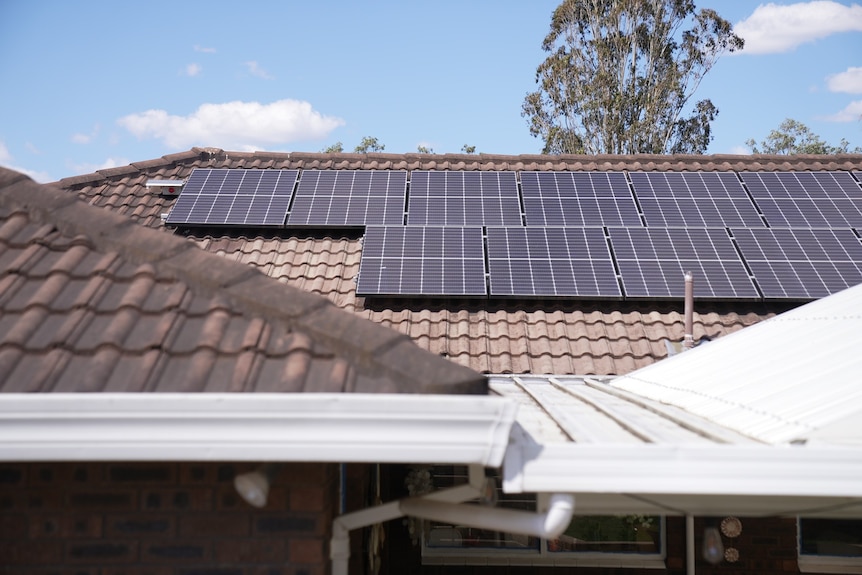 a house with solar panels on the roof