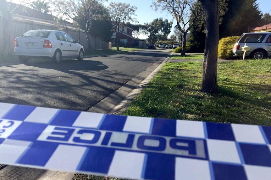 Police tape at a street in Roxburgh Park in Melbourne's north where two men were shot.